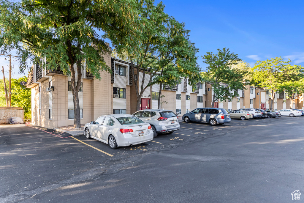Uncovered parking lot with a residential view