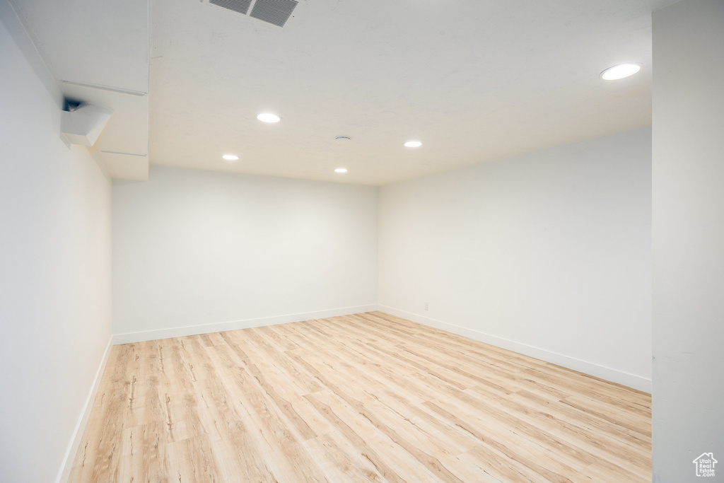 Unfurnished room featuring recessed lighting and wood finished floors