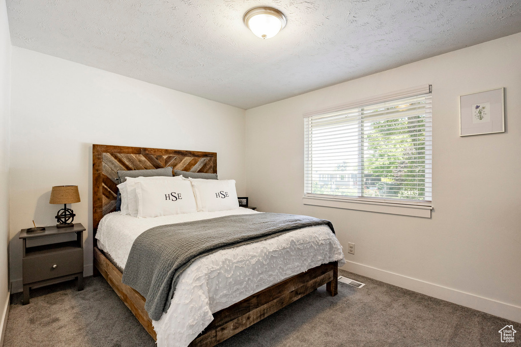 Bedroom featuring carpet flooring