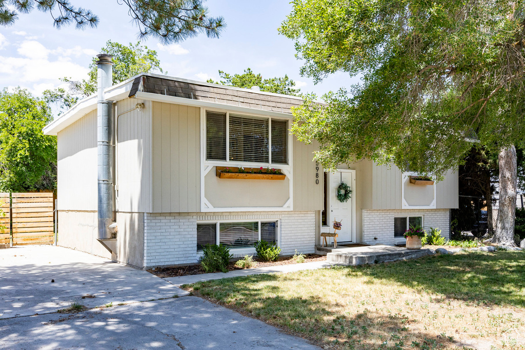 Bi-level home with brick siding