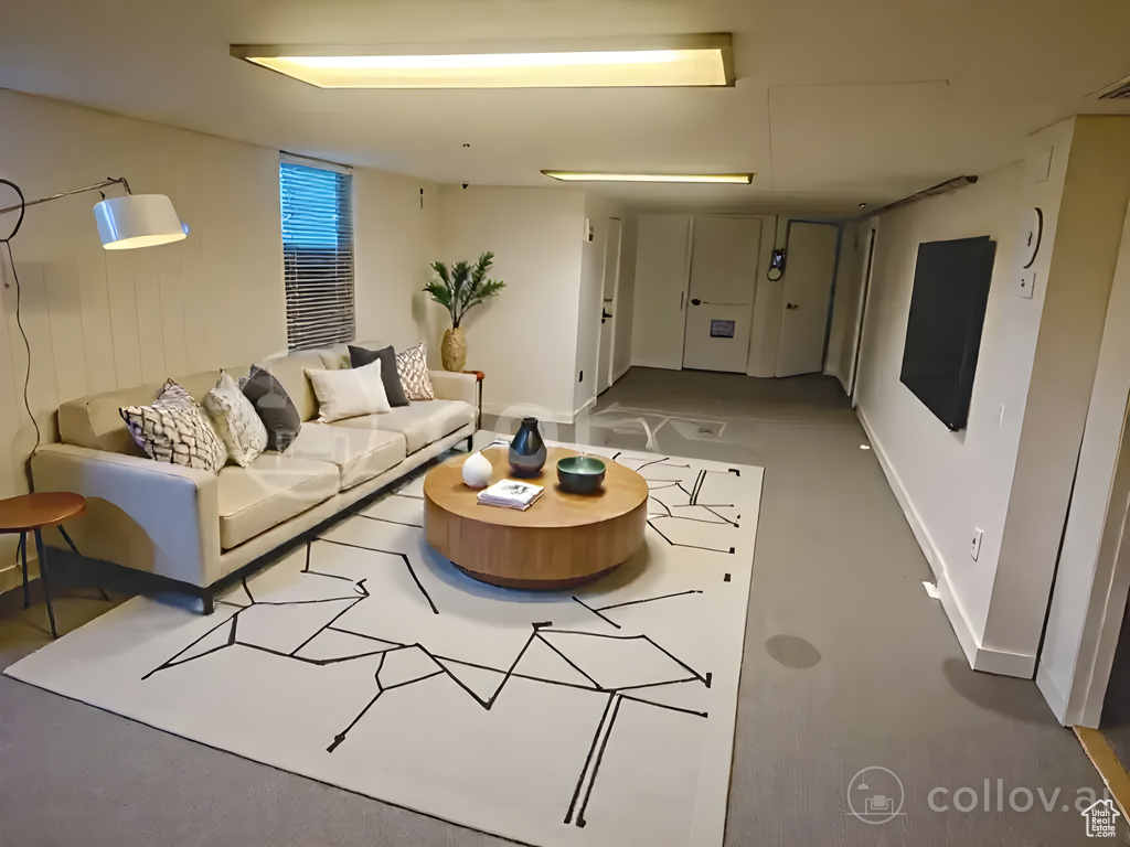 Living area featuring baseboards