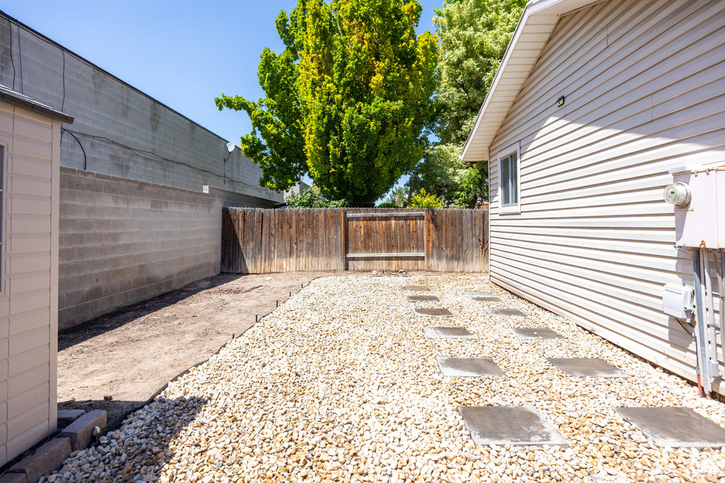 View of fenced backyard