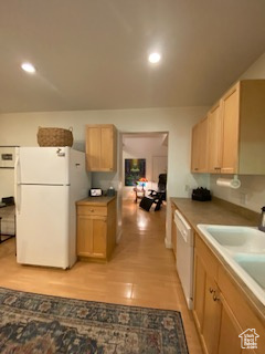 Kitchen featuring white appliances, light wood finished floors, recessed lighting, and light brown cabinetry