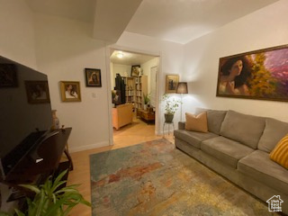 Living room featuring baseboards