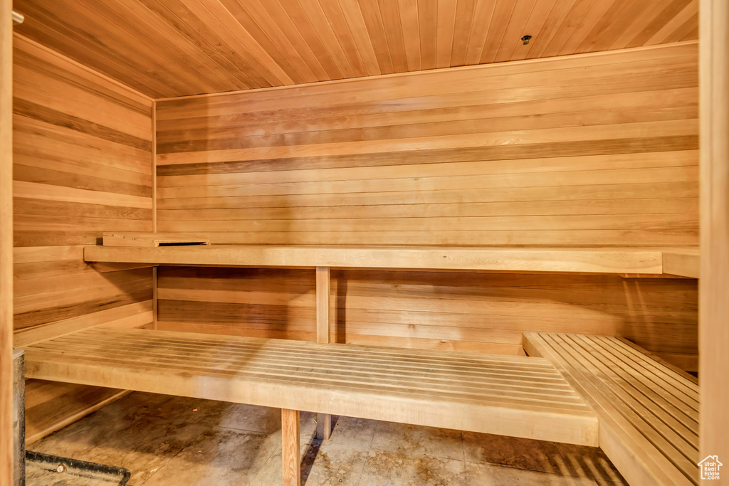 Relaxing sauna / steam room with wood walls and wood ceiling