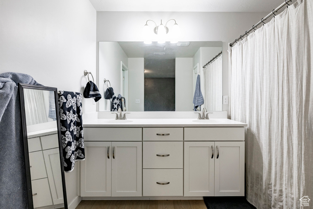 Full bathroom with double vanity
