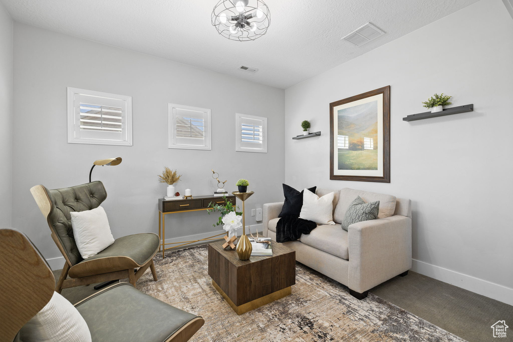 Living area featuring baseboards