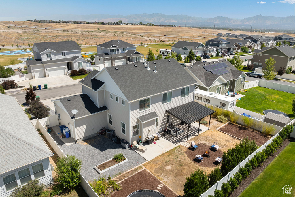 Aerial view of residential area with mountains