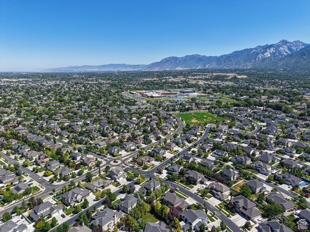 Aerial overview of property's location with a mountain backdrop