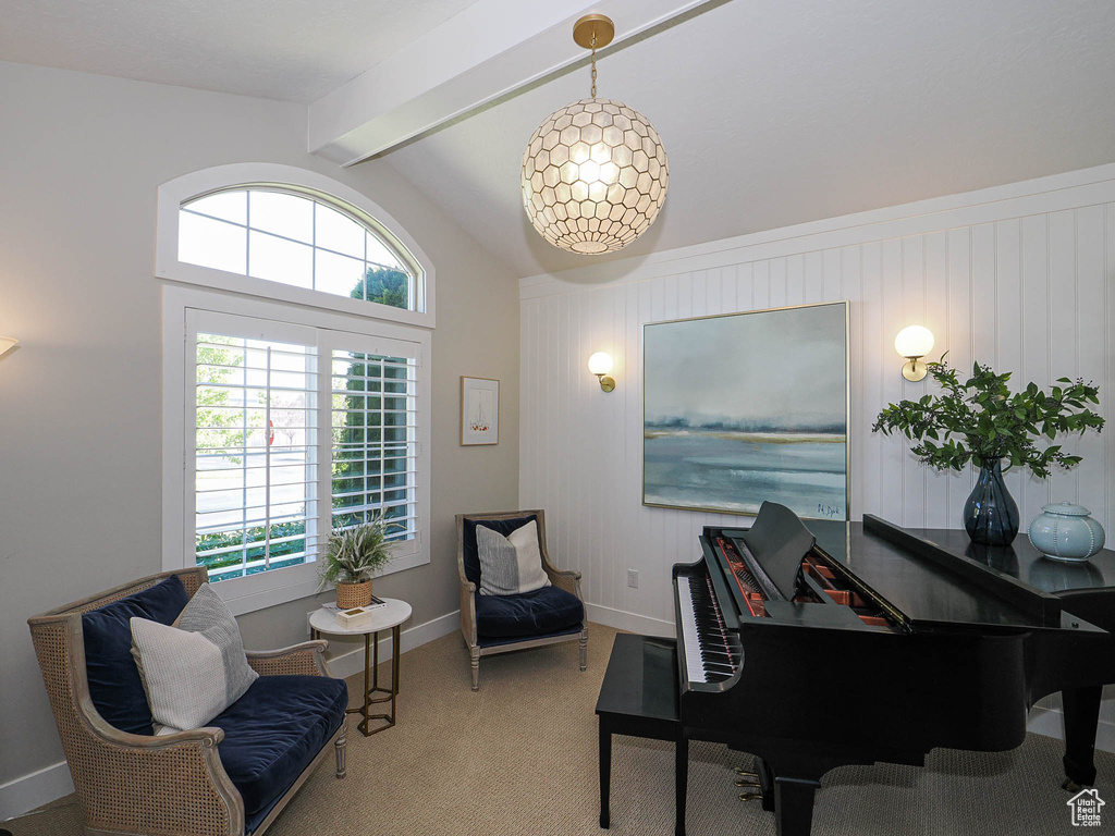 Living area with healthy amount of natural light and carpet floors