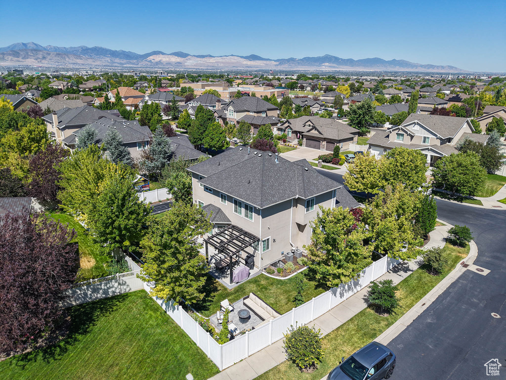 Aerial perspective of suburban area featuring mountains