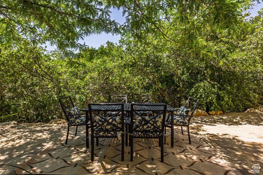 View of patio with outdoor dining area