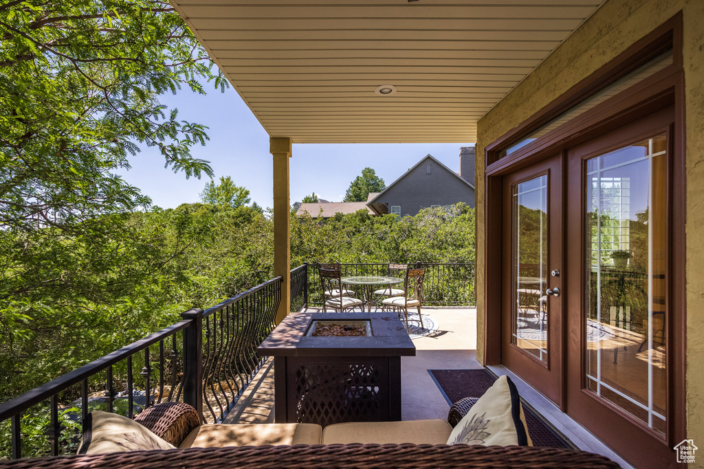 Wooden terrace with an outdoor fire pit