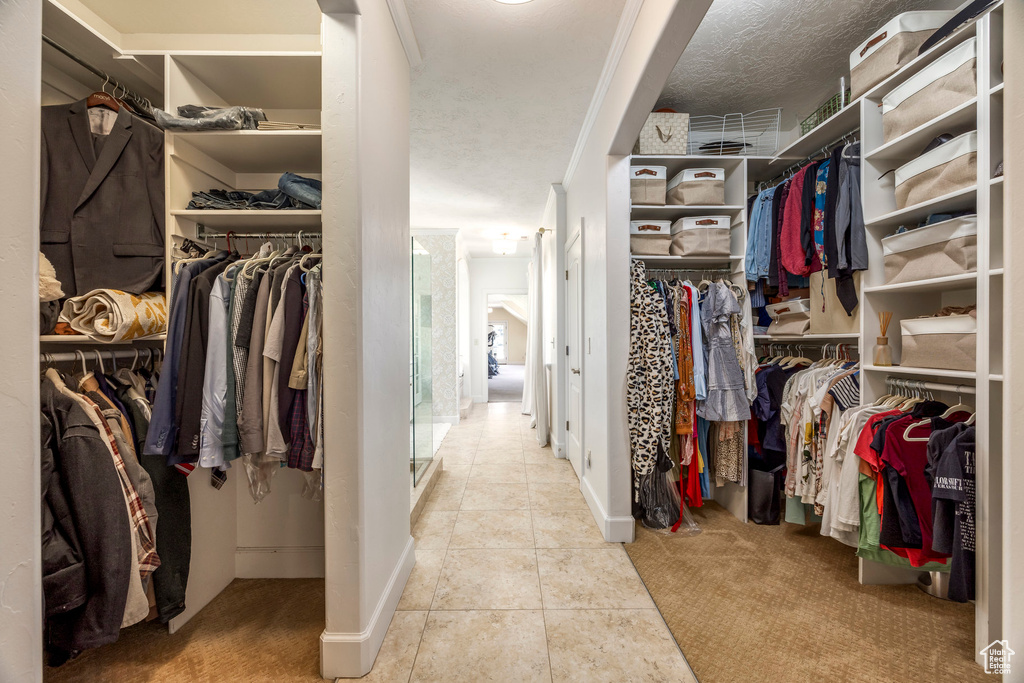 Spacious closet with tile patterned flooring