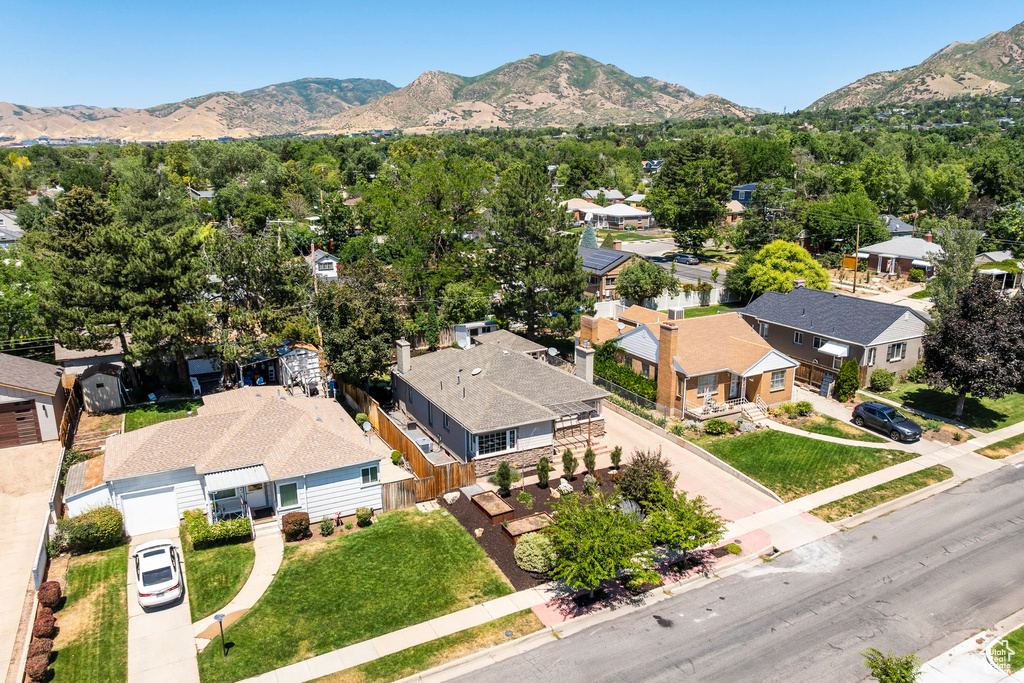 Aerial view of residential area with a mountainous background