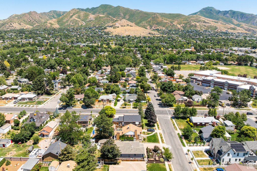 Aerial view of residential area featuring a mountain backdrop