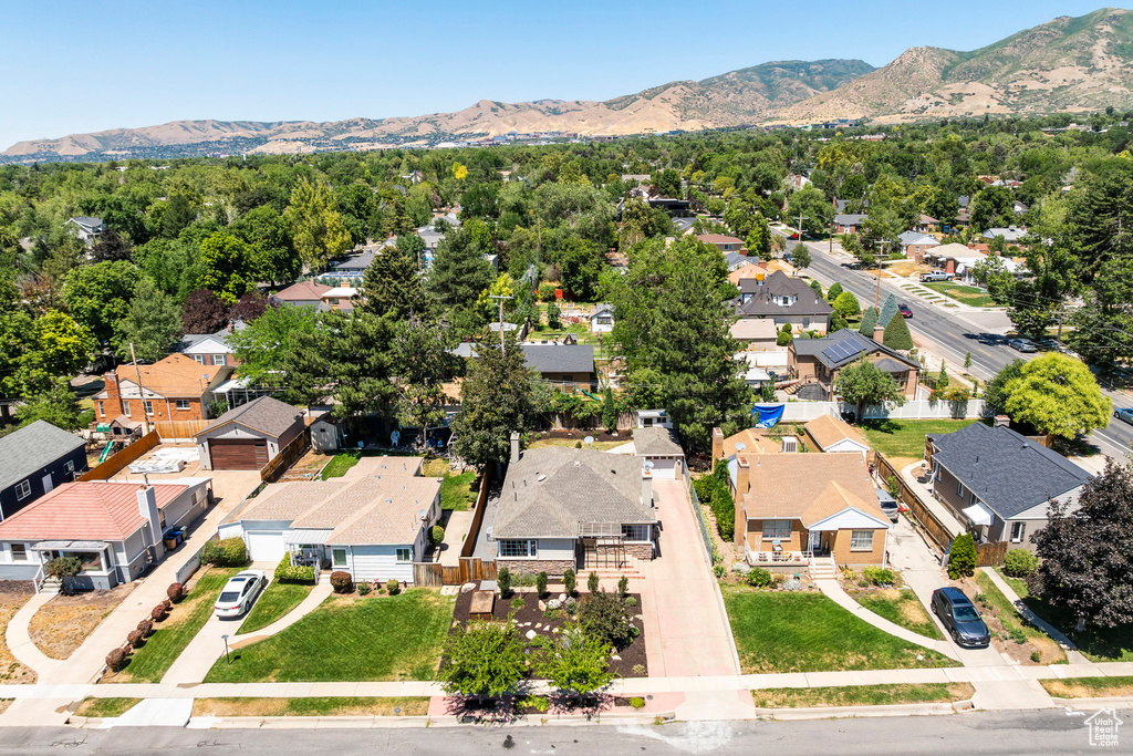 Aerial view of residential area featuring a mountain backdrop