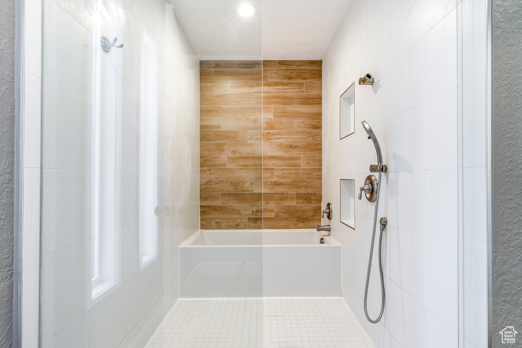 Bathroom featuring bathing tub / shower combination