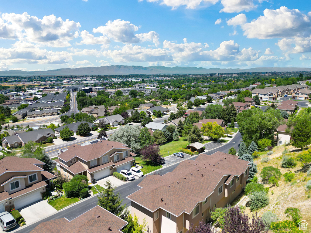Aerial view of residential area with a mountainous background