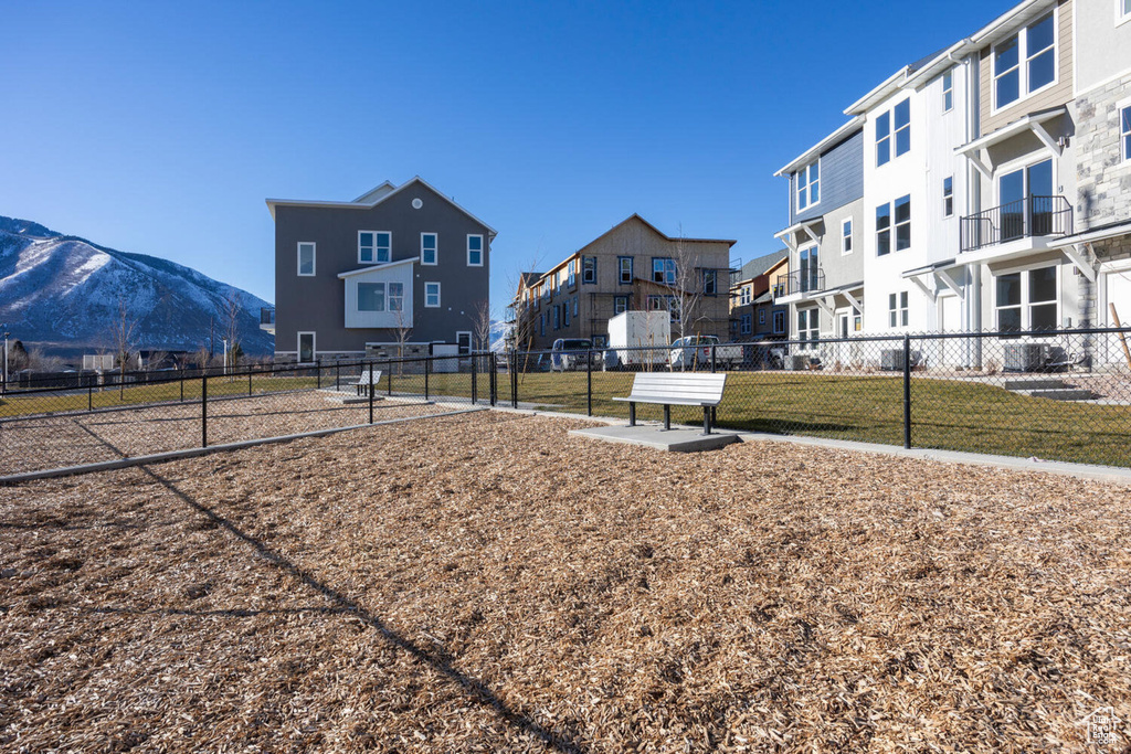 Surrounding community with a residential view and a mountain view