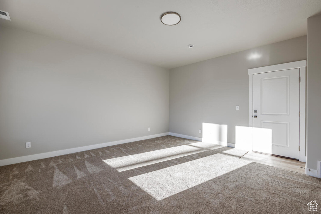 Unfurnished room featuring carpet floors