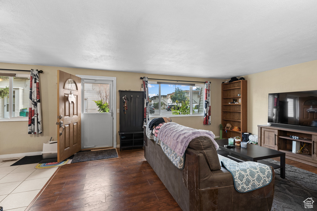 Living room with healthy amount of natural light and wood finished floors