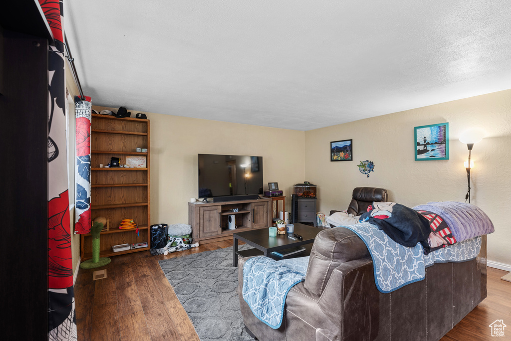 Living area with wood finished floors