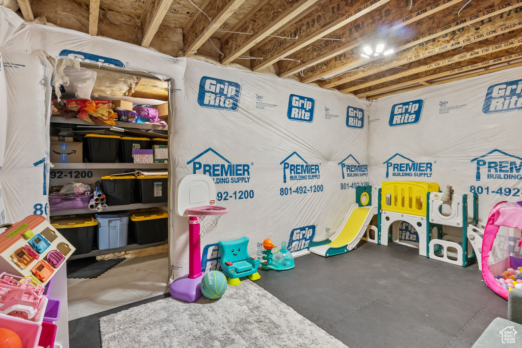 Playroom with concrete flooring