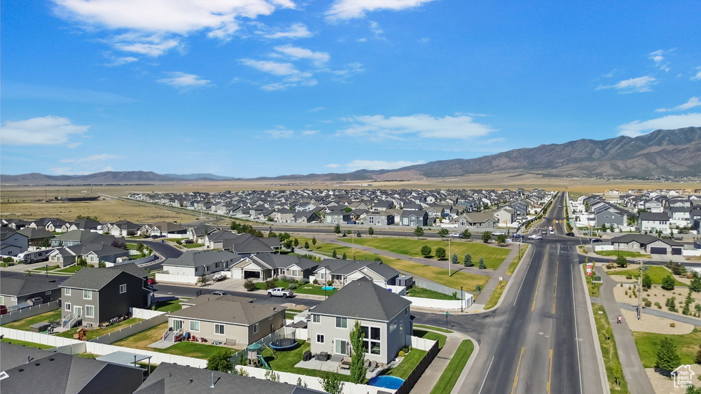 View of mountain background featuring nearby suburban area