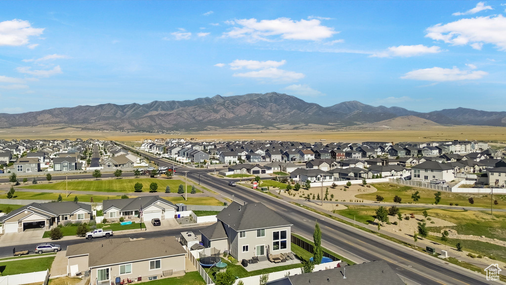 Mountain view featuring nearby suburban area