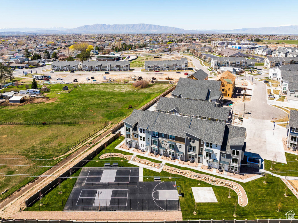 Aerial view of residential area featuring mountains