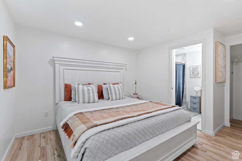 Bedroom featuring light wood-style floors and recessed lighting