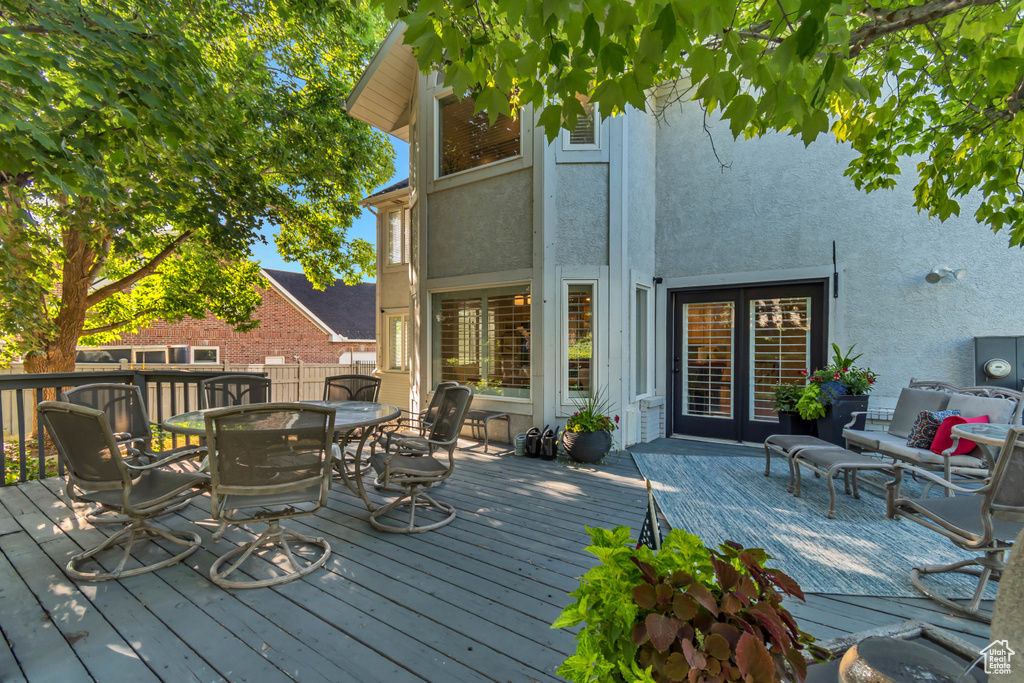 Wooden deck with outdoor dining area
