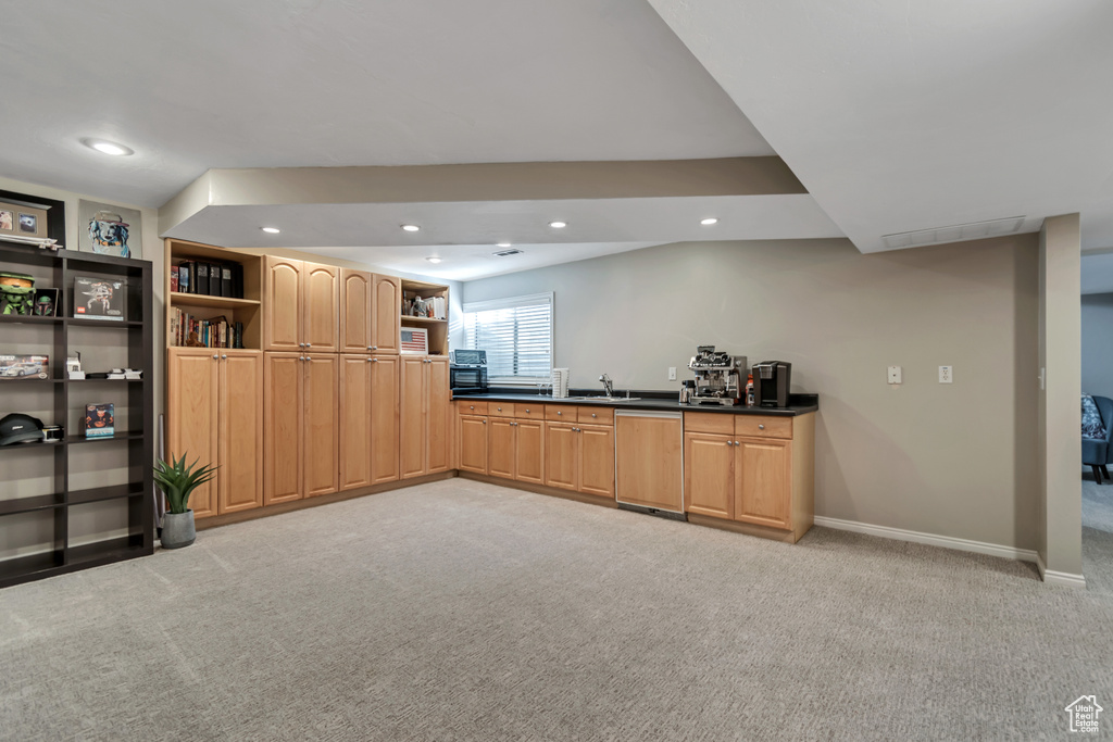 Bar with light carpet, recessed lighting, and dishwashing machine