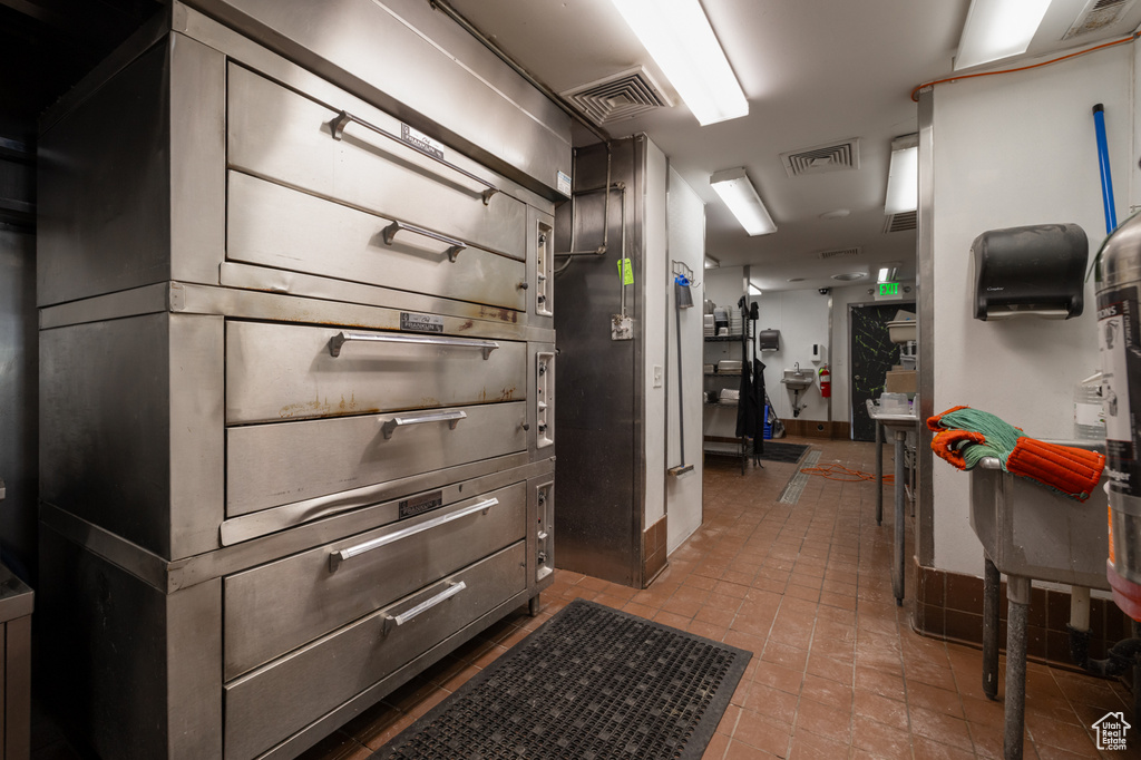 Kitchen featuring baseboards