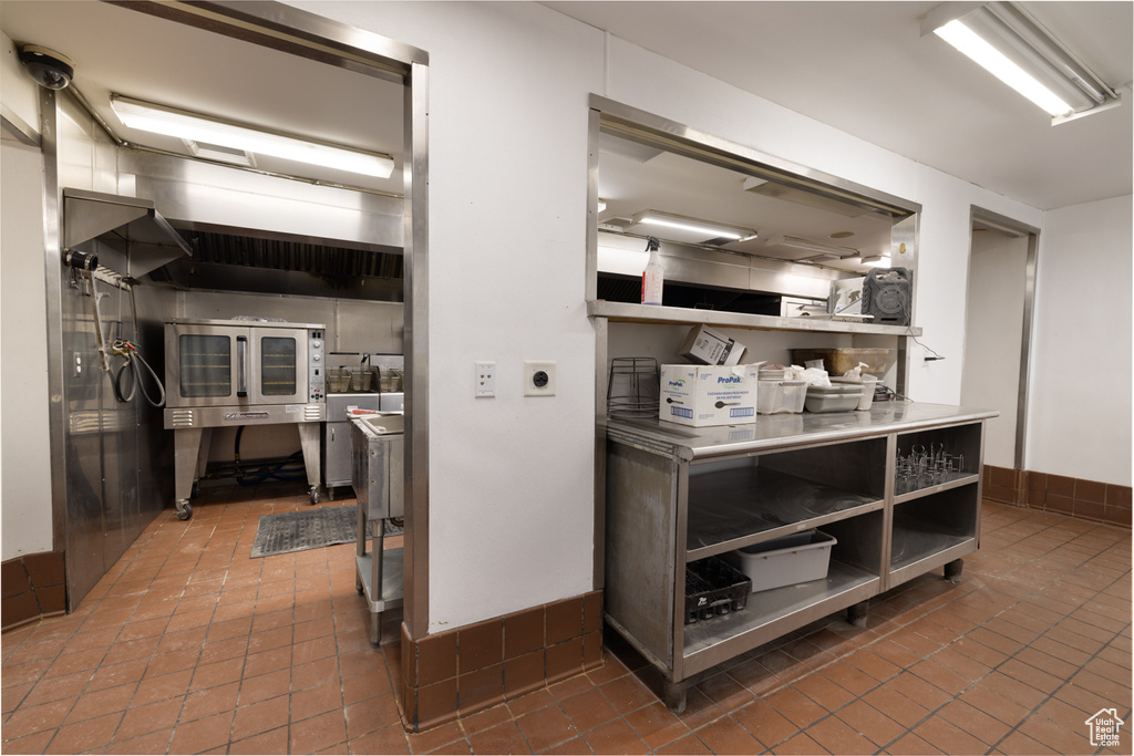 Kitchen featuring tile patterned floors