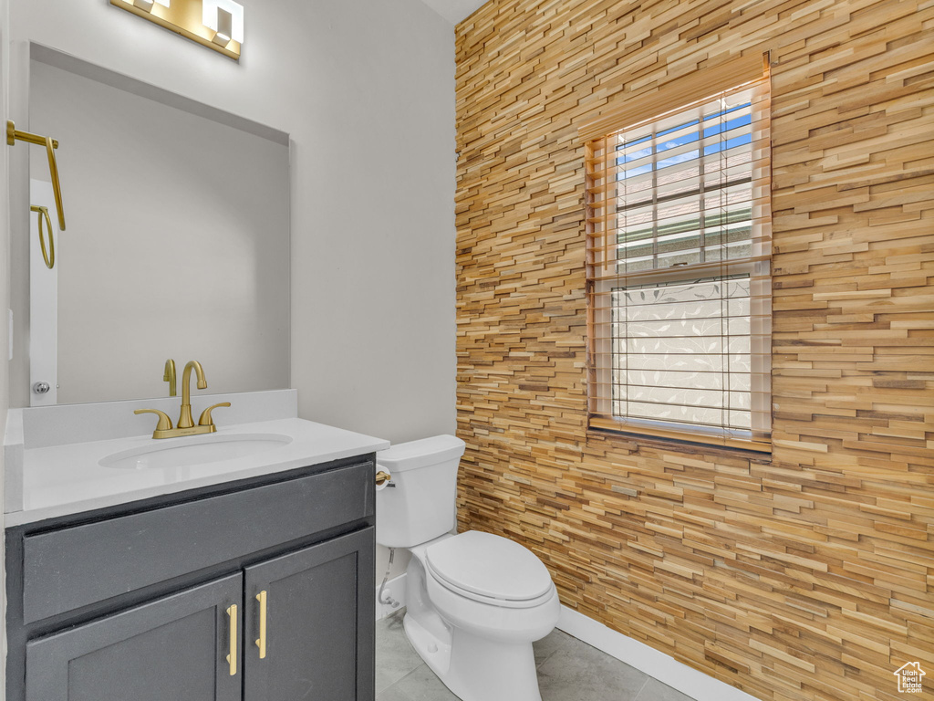 Bathroom with vanity and tile patterned floors
