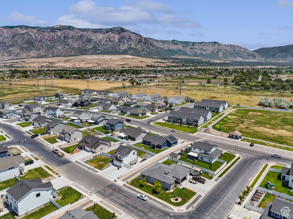 Aerial view of residential area with a mountainous background
