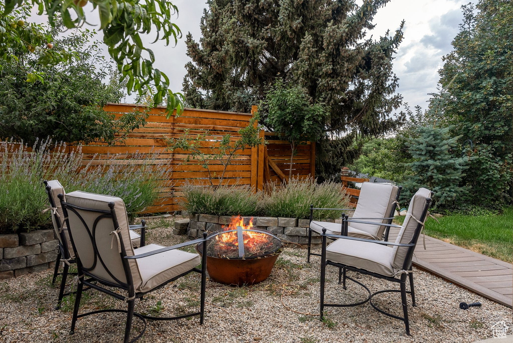 View of patio / terrace with a fire pit