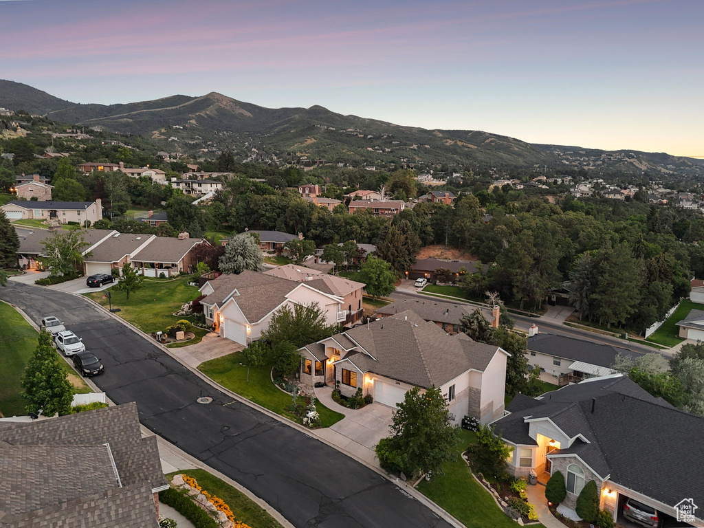 Aerial view at dusk of a mountain view and a residential view
