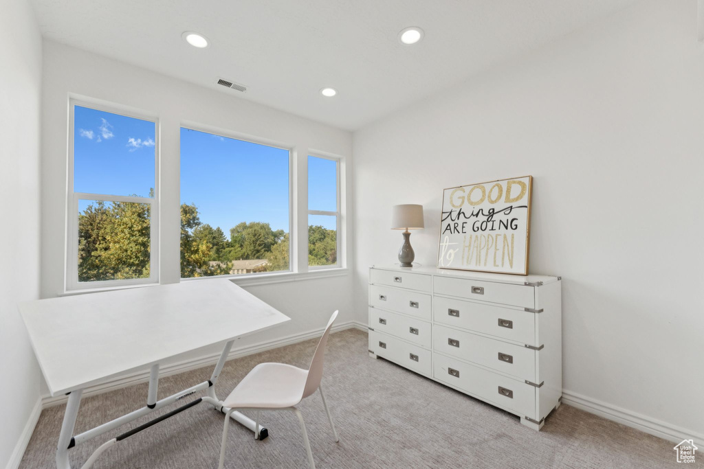 Carpeted home office featuring baseboards and recessed lighting