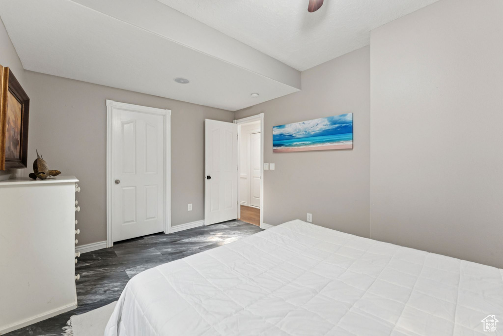 Bedroom featuring wood finished floors and ceiling fan