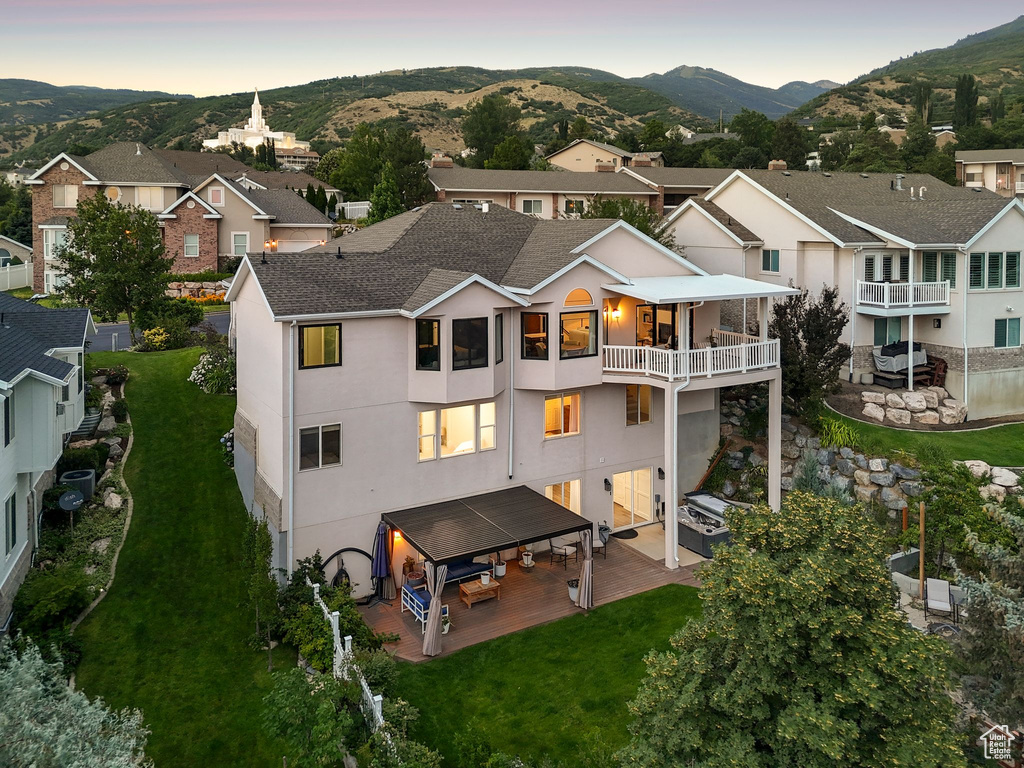 Aerial view of residential area with a mountain backdrop