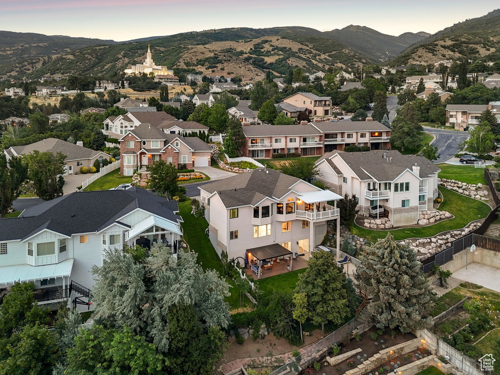 Aerial view at dusk of a mountain view and a residential view