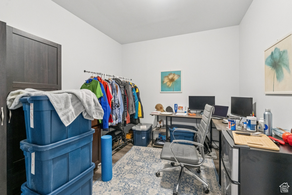 Office space featuring wood finished floors