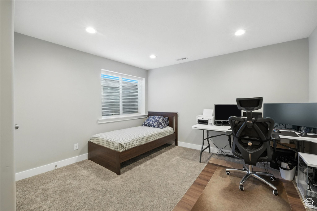 Office space featuring baseboards and recessed lighting