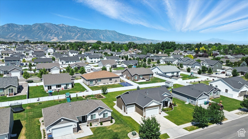 Aerial perspective of suburban area featuring mountains