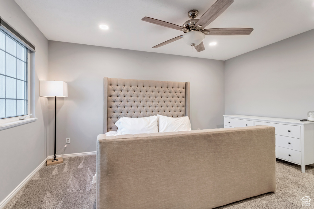 Bedroom featuring light carpet, recessed lighting, and ceiling fan