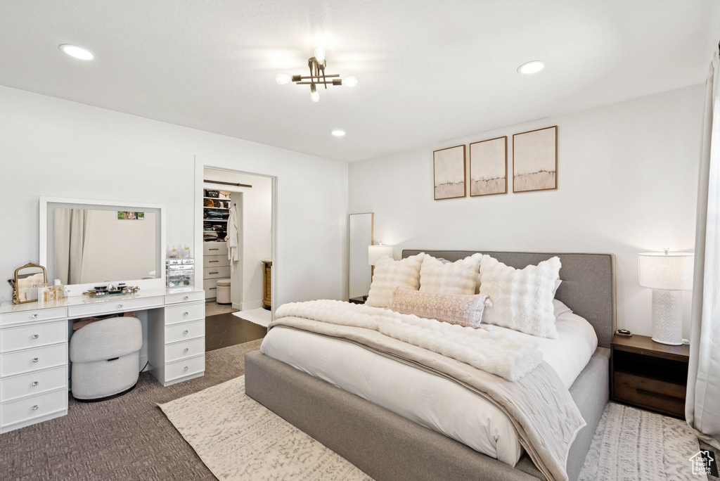 Bedroom featuring recessed lighting, carpet flooring, and a desk