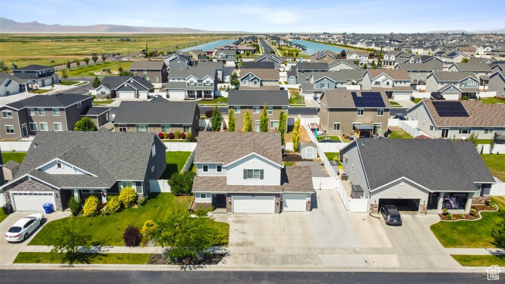 Aerial view of residential area with mountains